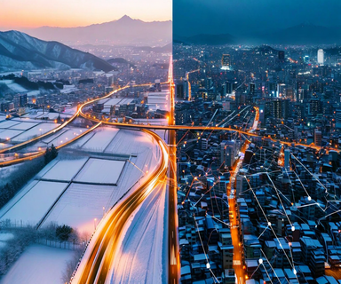 Aerial view of Japanese regions affected by extreme winter weather showing snow-covered mountains and frozen urban areas connected by illuminated digital network lines representing coordinated emergency response systems